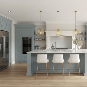 Large, modern, pale blue kitchen with breakfast bar, aligning with spring interior design trends