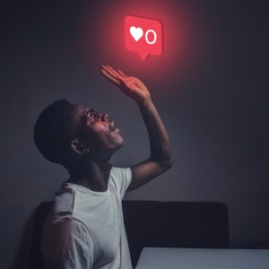 Man has hand in air touching a zero likes notification