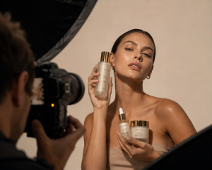Model posing with beauty products for PR